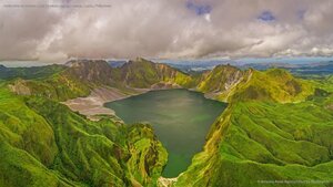 Aerial view of volcanic Lake Pinatubo and mountains, Luzon, Philippines