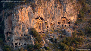 Ancient rock tombs carved into the cliff near Dalyan, Turkey