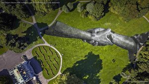 Artist Saype's 'Beyond Walls' installation in the Parc de la Grange, Geneva, Switzerland