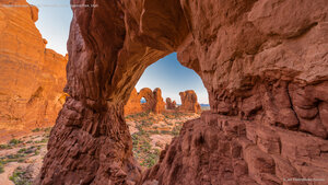 Double Arch seen through Cove Arch, Arches National Park, Utah