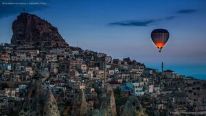 Hot-air balloon over Uçhisar in Cappadocia, Turkey