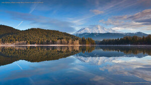Lake Siskiyou reflects snowy Mount Shasta in northern California