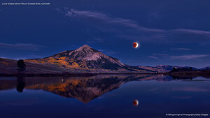 Lunar eclipse above Mount Crested Butte, Colorado