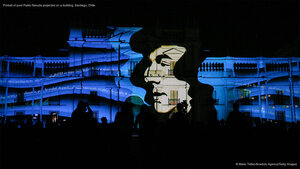 Portrait of poet Pablo Neruda projected on a building, Santiago, Chile