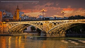 Seville, Spain’s Guadalquivir River and Triana Bridge for the 500th anniversary of Magellan’s departure