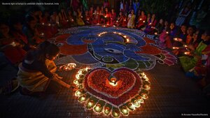 Students light oil lamps to celebrate Diwali in Guwahati, India