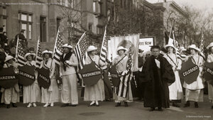 Dr. Anna Howard Shaw leading a suffrage parade in 1910s New York City