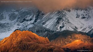 Sunlit ridges against volcanic scree on Eyjafjallajökull, a volcano in Iceland