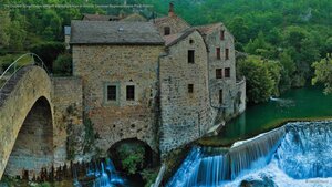 The Dourbie Gorge Corps Mill and adjoining bridge in Grands Causses Regional Nature Park, France