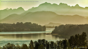 The Fraser River, east of Vancouver, British Columbia, Canada, with the Golden Ears mountains