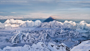 The shadow of Mount Everest over the western Himalayas in Nepal