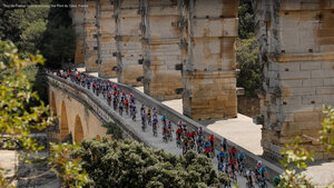 Tour de France cyclists crossing the Pont du Gard, France