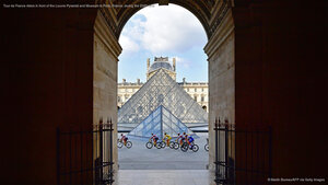 Tour de France riders in front of the Louvre Pyramid and Museum in Paris, France, during the 2020 race