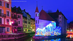 Winter scene illuminated on the Palais de l'Isle in Annecy, Haute Savoie, France